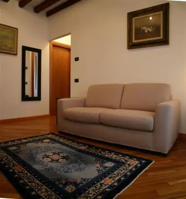 Area soggiorno di Salmaso Apartments
