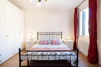 Letto o letti in una camera di Ricco di comfort, grande, luminoso e comodo