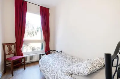 Letto o letti in una camera di Ricco di comfort, grande, luminoso e comodo