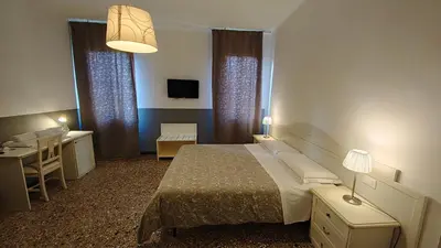 Letto o letti in una camera di Corte Loredana