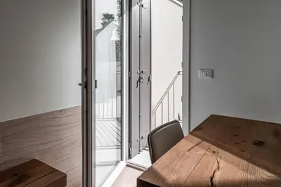 Letto o letti in una camera di Palazzo '900 Design Flats - Il Fondatore