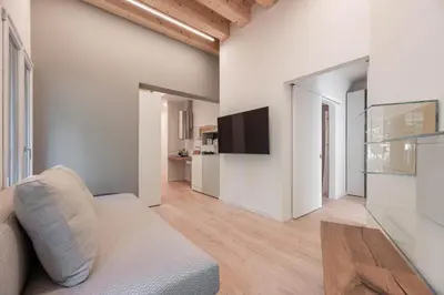TV o dispositivi per l'intrattenimento presso Palazzo '900 Design Flats - L'Orologiaio