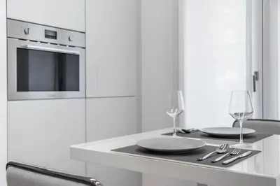 Cucina o angolo cottura di Palazzo '900 Design Flats - L'Orologiaio