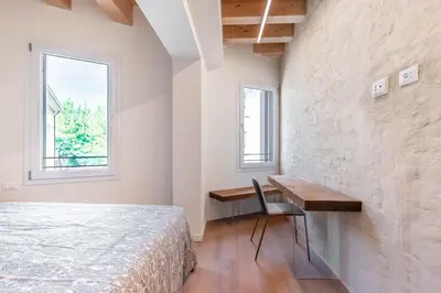 Letto o letti in una camera di Palazzo '900 Design Flats - Il Poeta