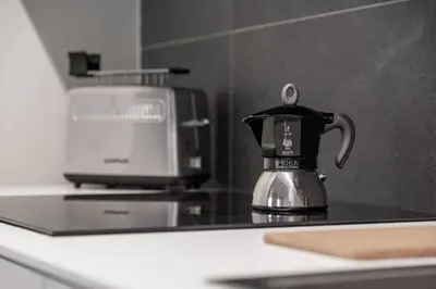 Set per la preparazione di tè e caffè presso Palazzo '900 Design Flats - Il Poeta