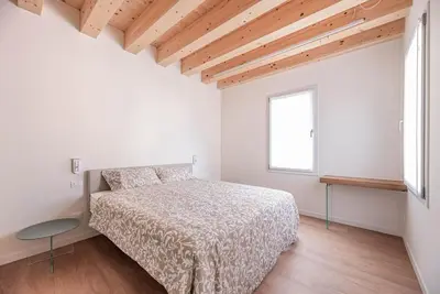 Letto o letti in una camera di Palazzo '900 Design Flats - Il Gran Salone
