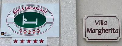 Certificato, attestato, insegna o altro documento esposto da VILLA MARGHERITA