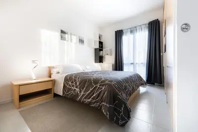 Letto o letti in una camera di Kya Venice and Beach House: Venezia, mare e laguna