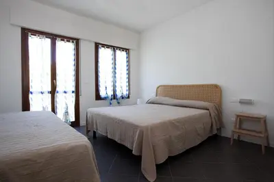 Letto o letti in una camera di Residenza Jennifer
