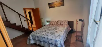Letto o letti in una camera di Sarika House