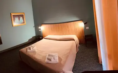 Letto o letti in una camera di Hotel Rey's