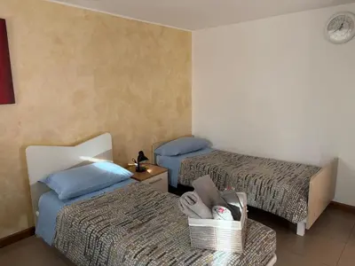 Letto o letti in una camera di La casa di Chicca