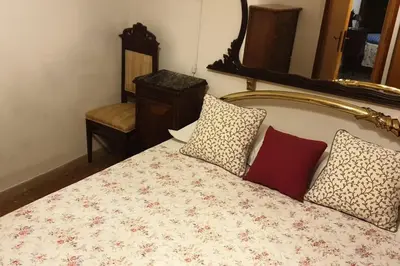 Letto o letti in una camera di Casa Forner, Venezia