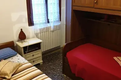 Letto o letti in una camera di Casa Forner, Venezia