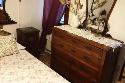 Letto o letti in una camera di Casa Forner, Venezia
