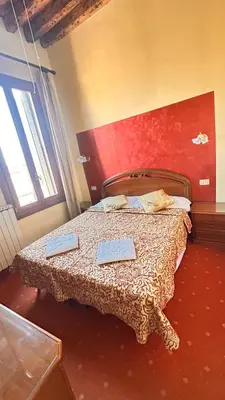 Letto o letti in una camera di Casa Lin Venice Zimmer