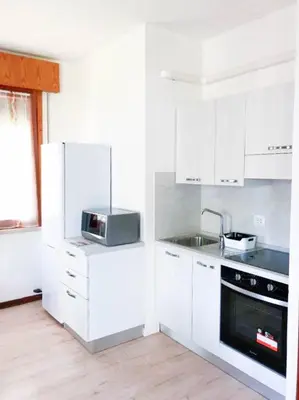 Cucina o angolo cottura di BUNGALOW CAVALLINO LIDO