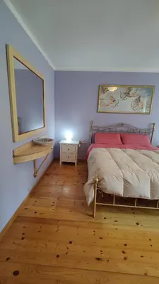 Letto o letti in una camera di Casa Monte Villa