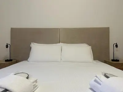 Letto o letti in una camera di Due Carrare Business