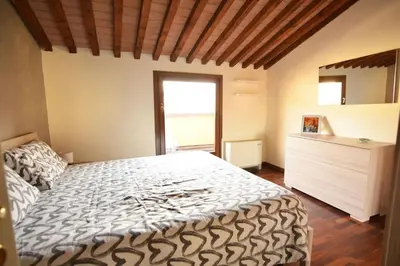 Letto o letti in una camera di Il Tamarindo - in pieno centro storico