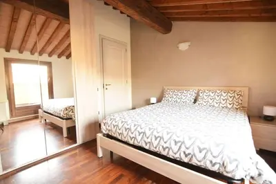Letto o letti in una camera di Il Tamarindo - in pieno centro storico