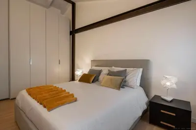 Letto o letti in una camera di [Elegant Suite Piave]Venezia Outlet