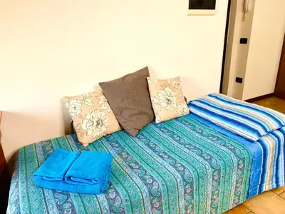Letto o letti in una camera di SUITE - Alessandra Holiday House