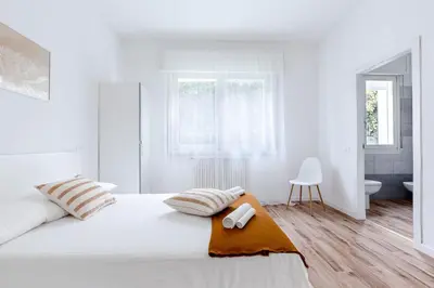 Letto o letti in una camera di Villetta Padova