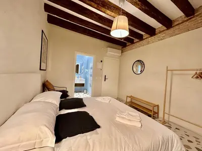 Letto o letti in una camera di Farini Suites wi-fi