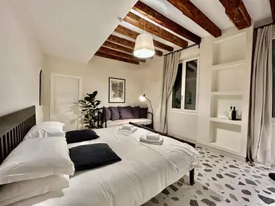 Letto o letti in una camera di Farini Suites wi-fi
