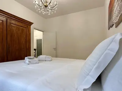 Letto o letti in una camera di Eclectic Space Padova two apartments