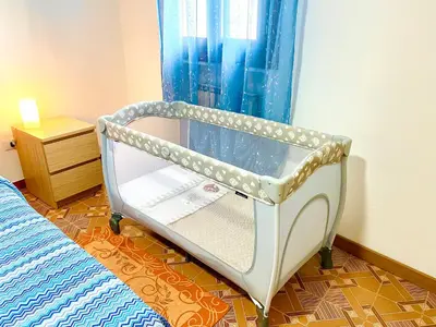 Letto o letti in una camera di HOME - Alessandra Holiday House