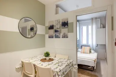 Letto o letti in una camera di GuestHost - Essential Apartment a 5 min da Piazza dei Signori