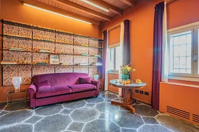 Area soggiorno di Dimora San Trovaso Stylish Four-Bedroom House in Venice