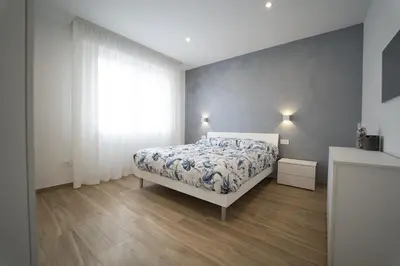 Letto o letti in una camera di Casa Vacanze Residence Trifoglio
