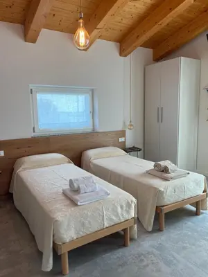 Letto o letti in una camera di Agriturismo da Natalino