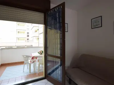 Area soggiorno di Apartment Acquamarina-4 by Interhome