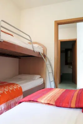 Letto o letti in una camera di Apartment Solmare-10 by Interhome