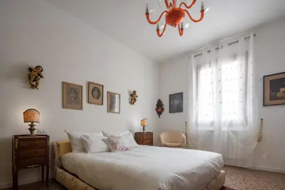 Letto o letti in una camera di Tiepolo Apartment in the Biennale District R&R