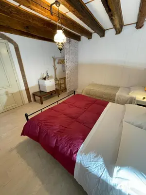 Letto o letti in una camera di KING'S GARDEN
