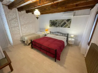 Letto o letti in una camera di KING'S GARDEN