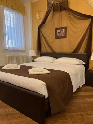 Letto o letti in una camera di CasaBella