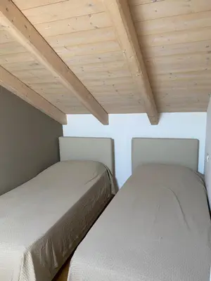 Letto o letti in una camera di Cascina Jesolana