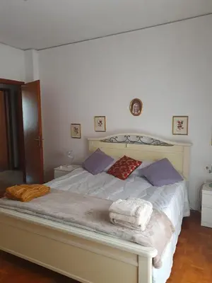 Letto o letti in una camera di Casa Antonietta di Filippo