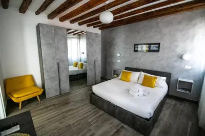 Letto o letti in una camera di YELLOW GARDEN