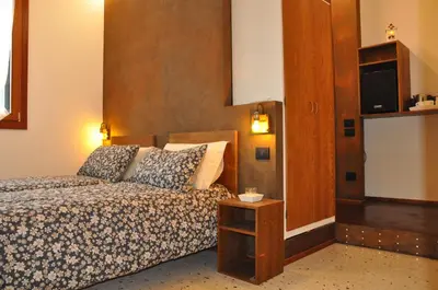 Letto o letti in una camera di NAZIONALE Camere