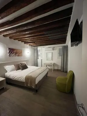 Letto o letti in una camera di Ca’ Briani