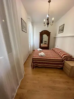 Letto o letti in una camera di 1 Ramo Grimani
