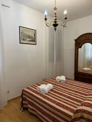 Letto o letti in una camera di 1 Ramo Grimani