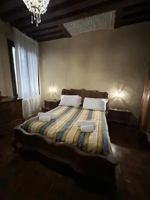 Letto o letti in una camera di 1 Ramo Grimani
